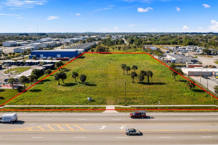 4 acres on South US 1. Very rare Industrial zoning as 99% of US1 is zoned general commercial. Allows a more variety of uses. Cleared and filled. 300 feet on US1 with 577 ft of depth. City water and sewer available. Average of 30,000 cars per day pass this site. See documents tab for Survey, Topo, Conceptual Site plans for Self Storage Project,( designed with one 3-story Big Box climate building with 76,500 square feet and several single-story buildings with standard drive-up units of 28,350 square feet), Tortoise Report, Geotech Report and utilities map. Natural Gas line is in front of the property, 8'' water main is also in front of the property. Sewer force main 8'' PVC is on the other side of US #1.