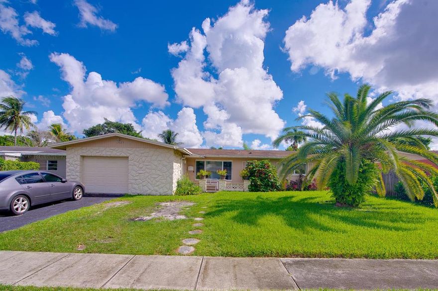 Incredible opportunity to purchase this 3 bedroom, 2 bathroom home with a 1 car garage in North Lauderdale. This home features separate living and family rooms, larged screened patio, fruit trees, impact windows and doors, newer A/C (2019), and water treatment system. Ideally located near shops, dining, and directly across from the neighborhood park and playground.
