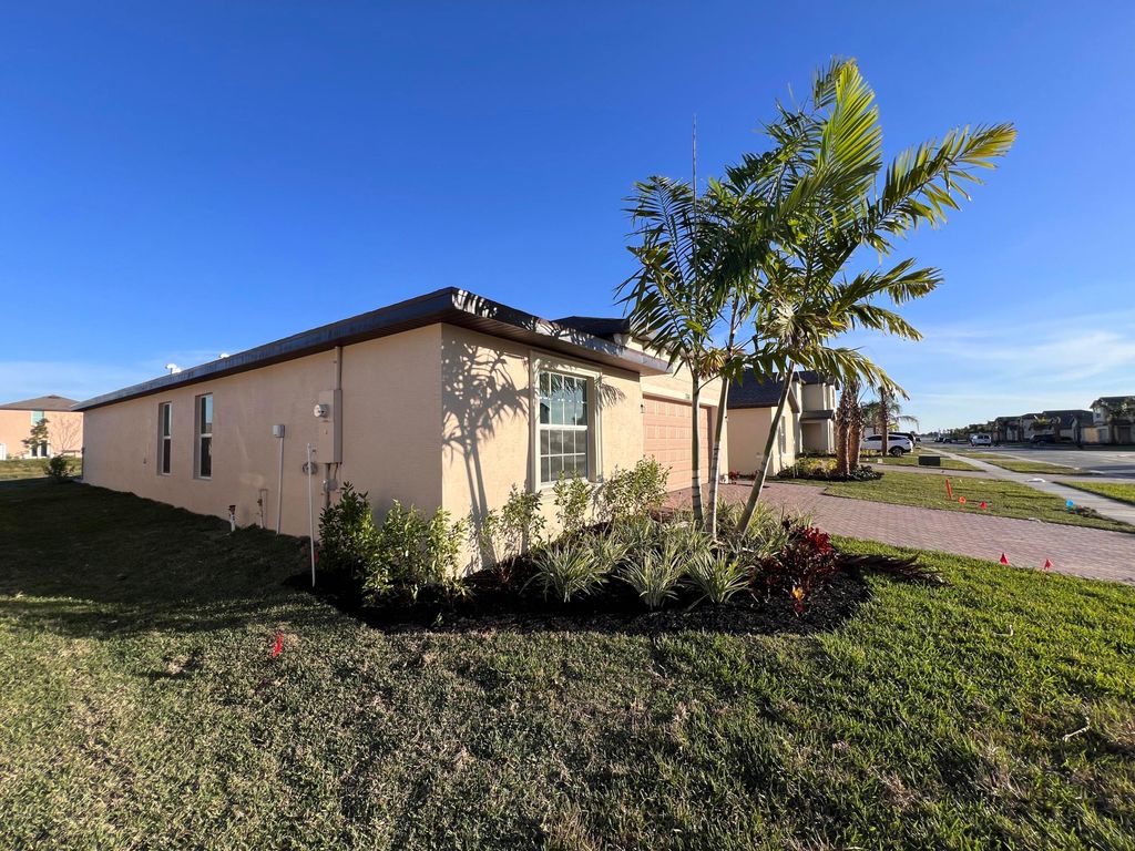 Photo of 766 W Carlyle Way W, Fort Pierce, FL 34947 (MLS # R11049086)