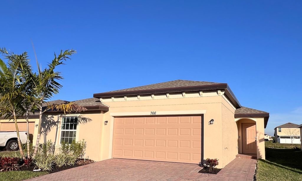 Photo of 766 W Carlyle Way W, Fort Pierce, FL 34947 (MLS # R11049086)