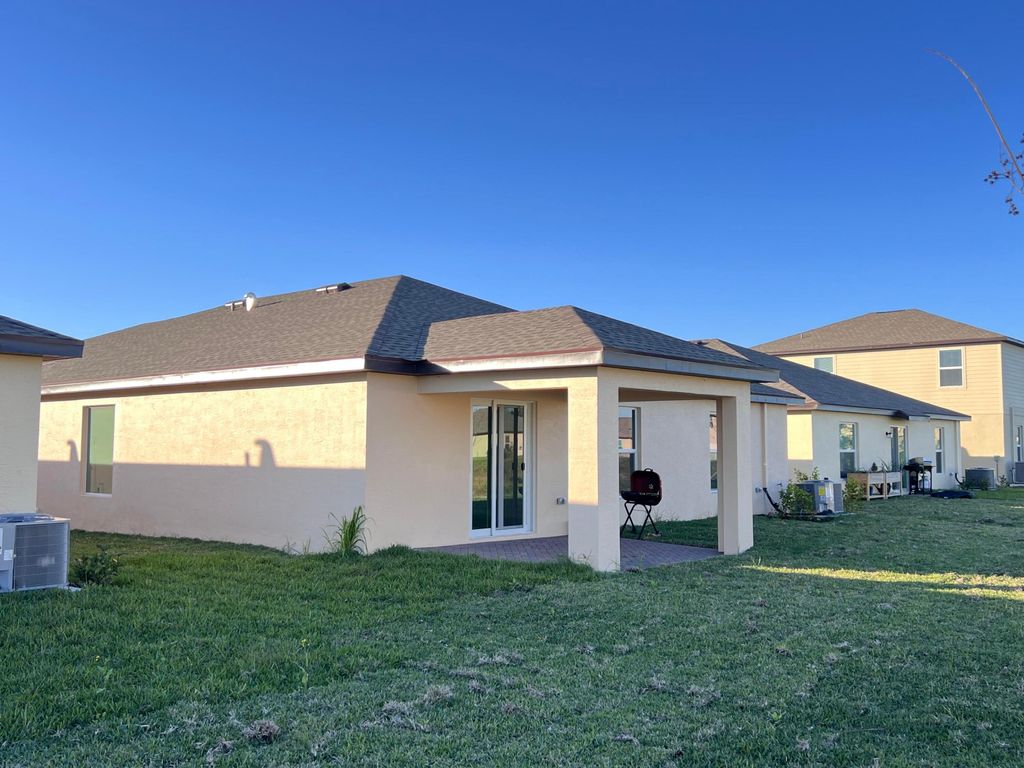 Photo of 766 W Carlyle Way W, Fort Pierce, FL 34947 (MLS # R11049086)