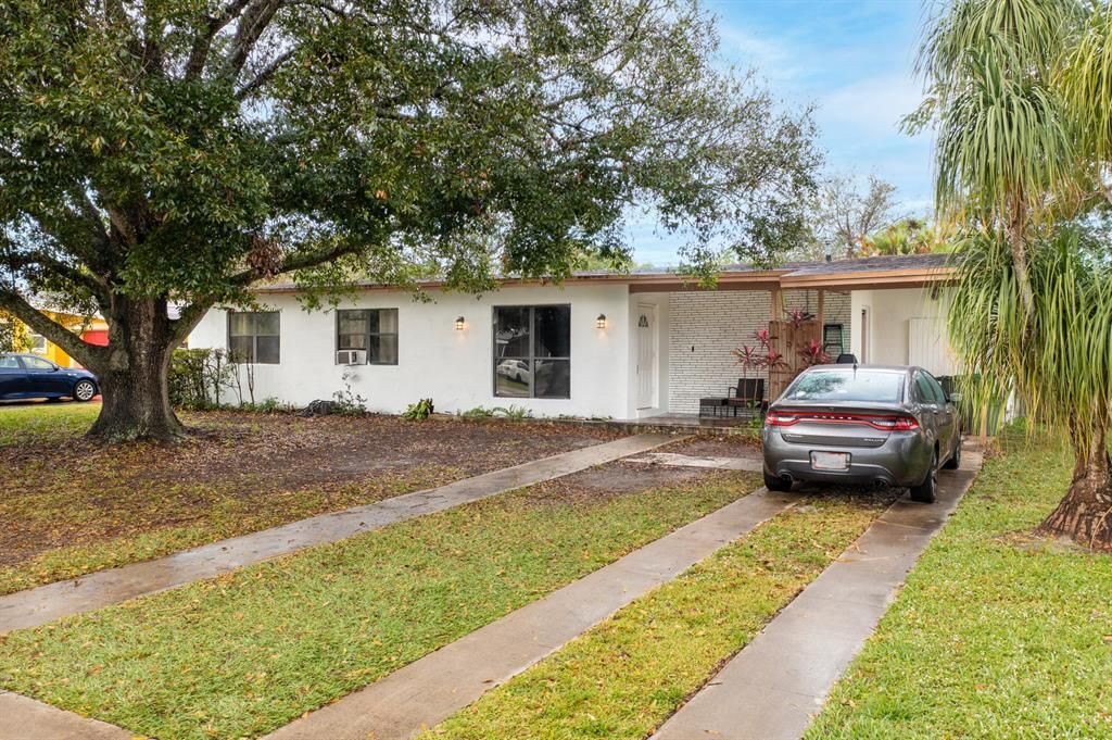 Photo of 114 NE Estia Lane, Port St Lucie, FL 34983 (MLS # R10856070)