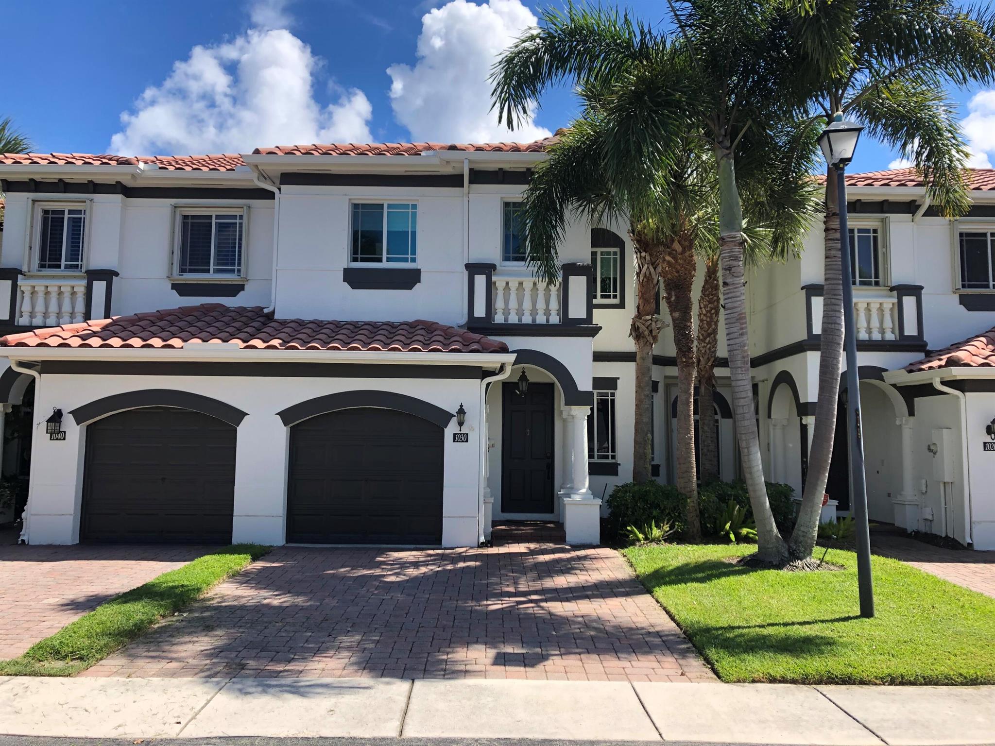 Murano Bay is a small, friendly, gated community tucked away near the intracoastal waterway just moments from beaches and downtown. This particular townhome boasts a master suite featuring an additional room (for sitting, office, exercise, or nursery), walk-in closet, dual vanity sinks, stand alone shower and separate soaking tub. Volume ceilings, hardwood, tile, and new engineered wood flooring throughout. Stainless and granite kitchen equipped with eating space, wine chiller, and bar area. Partially covered patio offers shade and sunlight, a waterfront view, and plenty of privacy. Heated pool and jacuzzi just steps away from front door. New impact windows and doors. Newer A/C. Cable and high speed internet included.