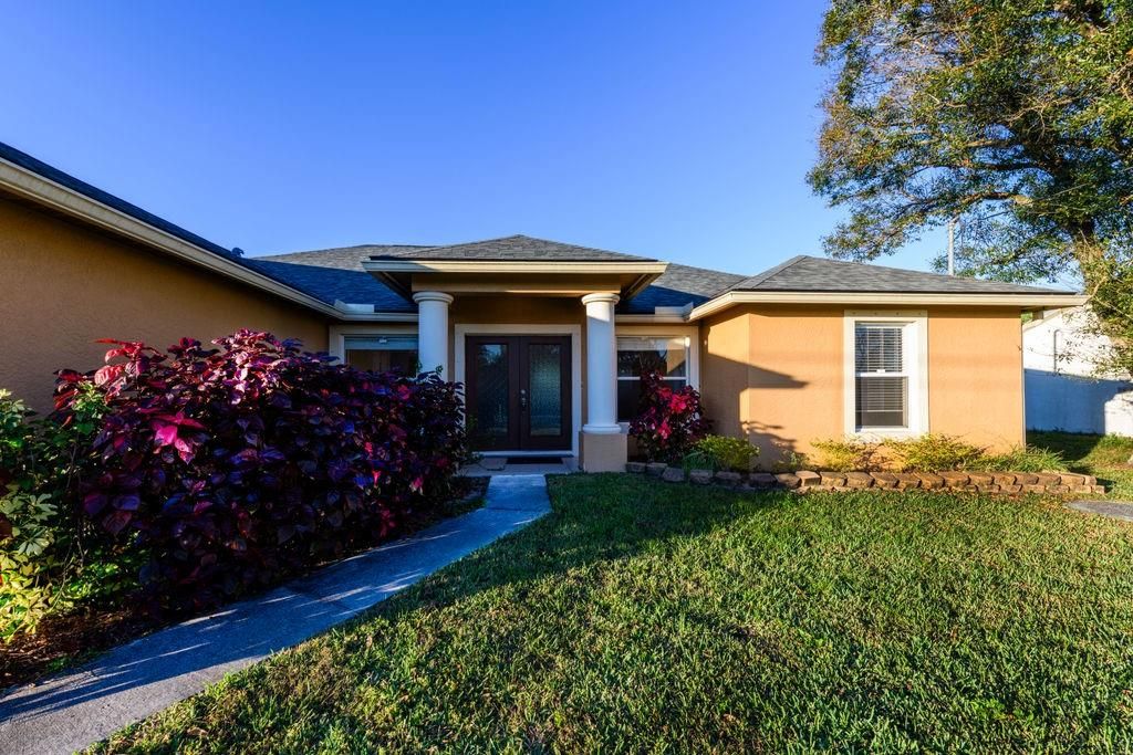 Photo of 729 Tulip Boulevard, Port Saint Lucie, FL 34953 (MLS # F10415775)