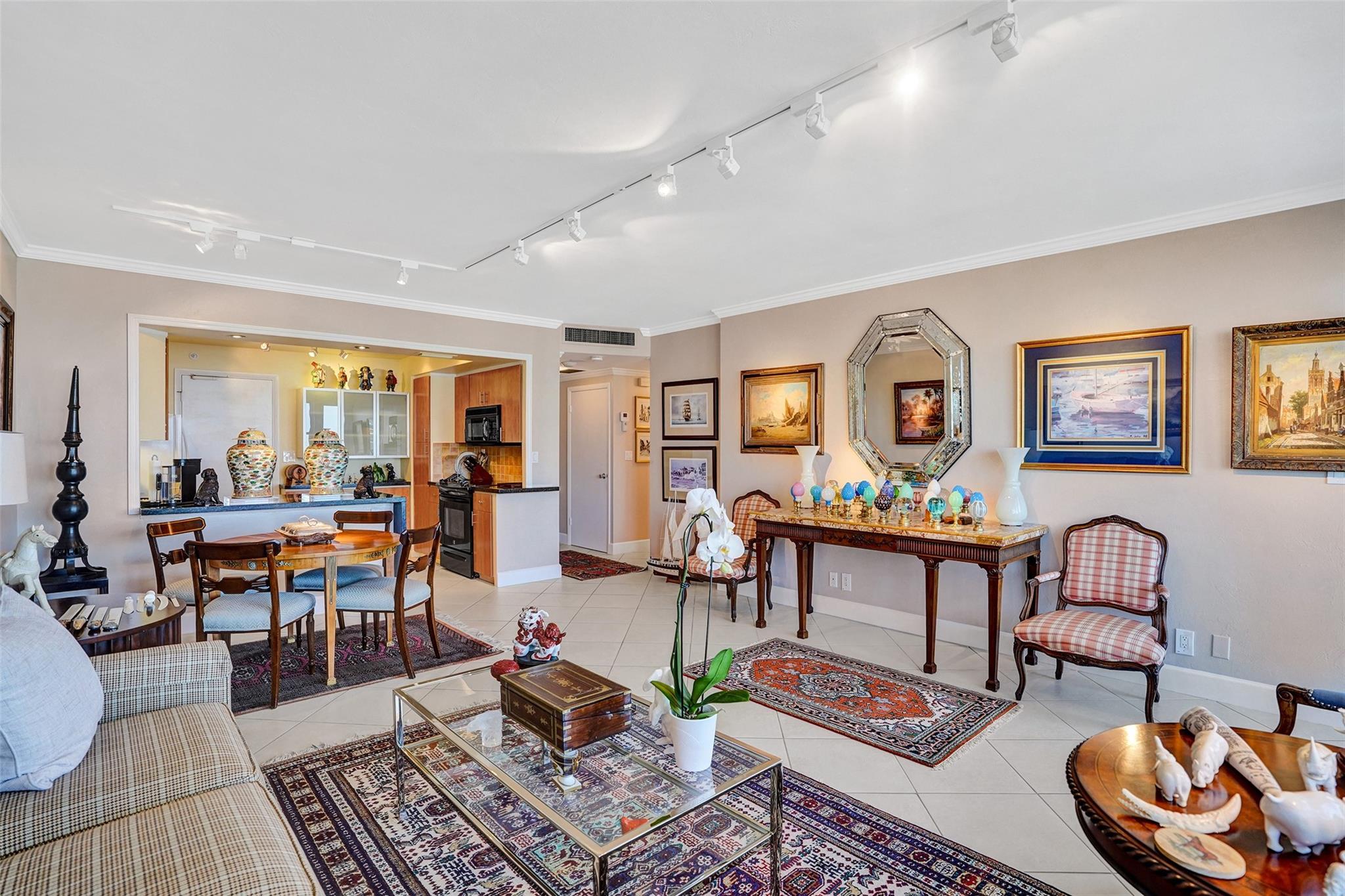 Walk to the beach,restaurants, shopping from this great location. Spectacular views of the intracoastal and ocean from the balcony as you sit out with your evening beverage of choice. This move-in ready unit exudes warmth and comfort throughout. Elegant crown molding throughout. Tile Floors in living area, and soft cozy carpet in Bedroom. Impact Glass throughout, a brand new balcony with stunning views. You never have to leave the premises. Lobby level has a fitness room,Library, and large Community Room for your convenience, bike Storage. Or, step out the door to the large private pool and canopied area to get out of the sun, and perhaps do some BBQing. 55+ Co-Op provides the best of easy living, with access to all area activities. Assessments were paid by Seller. No Pending assessments