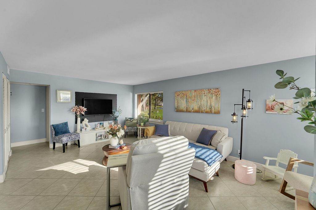 Photo of 261 Wimbledon Lake Drive, Plantation, FL 33324 (MLS # B26002793)