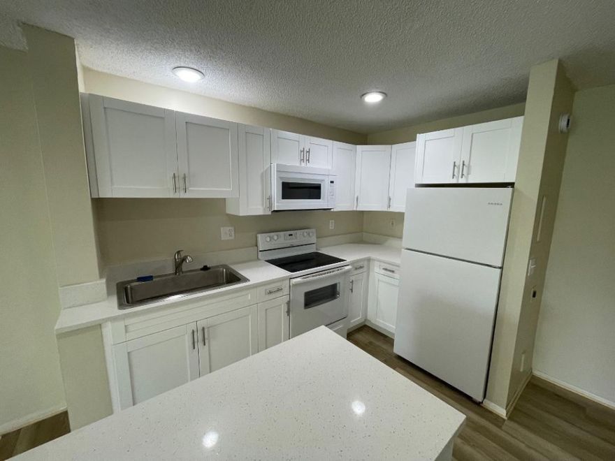 WOW- Great value- great area-- 620 credit score required per association- NEW kitchen with quartz countertops- NEW bathroom- NEW FLOORING.