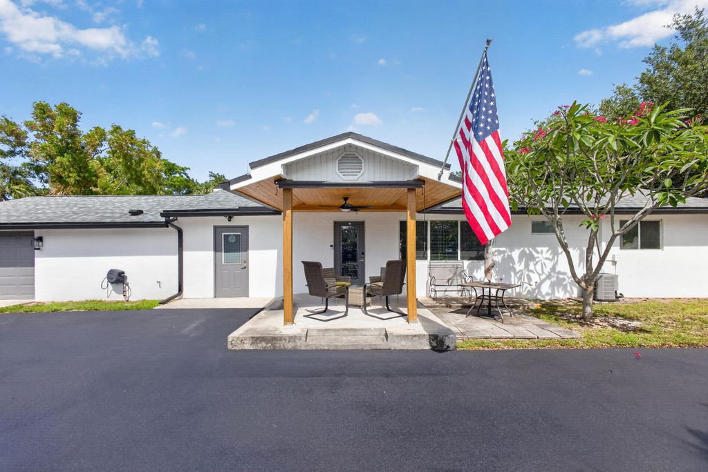 Photo of 5500 West Place, Mangonia Park, FL 33407 (MLS # B26032099)