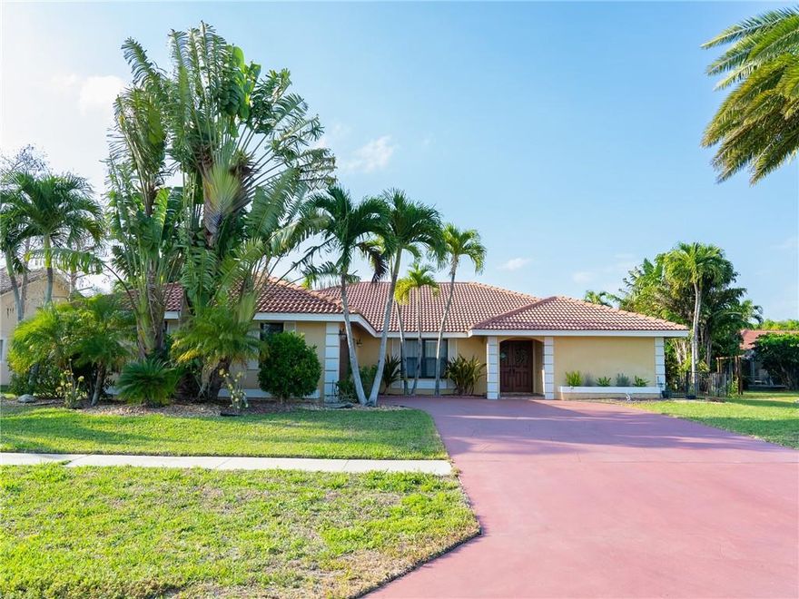 Welcome to Chatsworth Village in Wellington. This neighborhood does not have an HOA. This is a great home for entertaining with family and friends. It's a well maintained home, and is meticulously clean. Split floor plan that has a Master Suite and 3 additional bedrooms. Open and airy with vaulted ceilings. IMPACT WINDOWS and DOORS. There is plenty of room for a large family, and even the in-laws. The converted garage has an air conditioned bedroom/man-cave/she-shed. Can easily be converted back to a 2 car garage. Fabulous backyard with a pool(baby gate) large covered patio, lots of foliage and a "beach" with fire pit. In this home you would be centrally located to everything Wellington has to offer. All schools are near by.