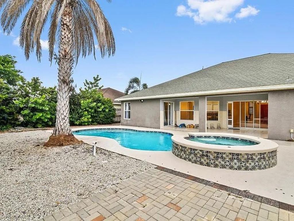 Photo of 602 SW Mccall Road, Port Saint Lucie, FL 34953 (MLS # F10544930)