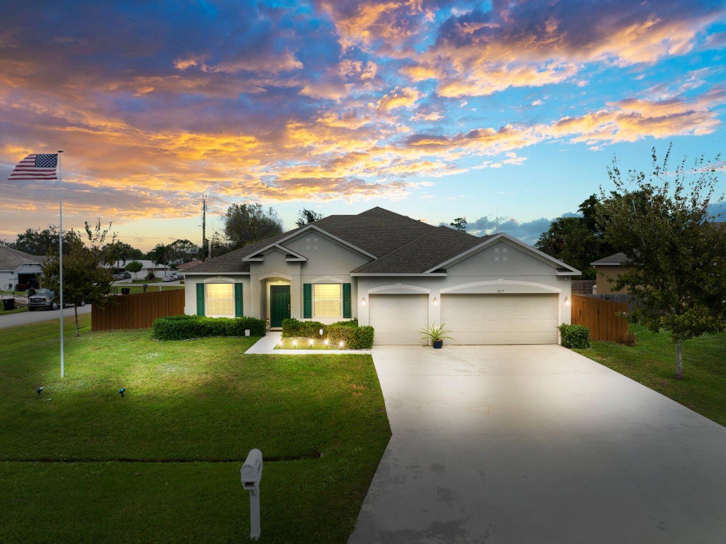 Photo of 1477 SW Goodman Avenue, Port Saint Lucie, FL 34953 (MLS # R10957254)