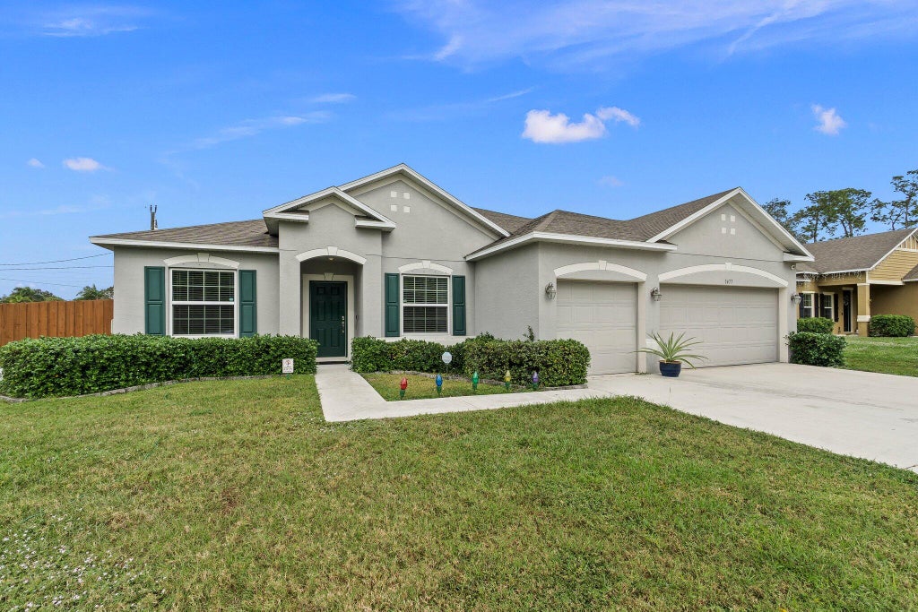 Photo of 1477 SW Goodman Avenue, Port Saint Lucie, FL 34953 (MLS # R10957254)