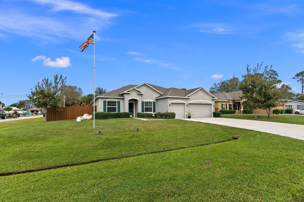 Photo of 1477 SW Goodman Avenue, Port Saint Lucie, FL 34953 (MLS # R10957254)