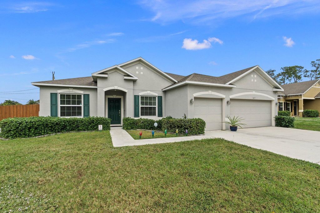 Photo of 1477 SW Goodman Avenue, Port Saint Lucie, FL 34953 (MLS # R10957254)