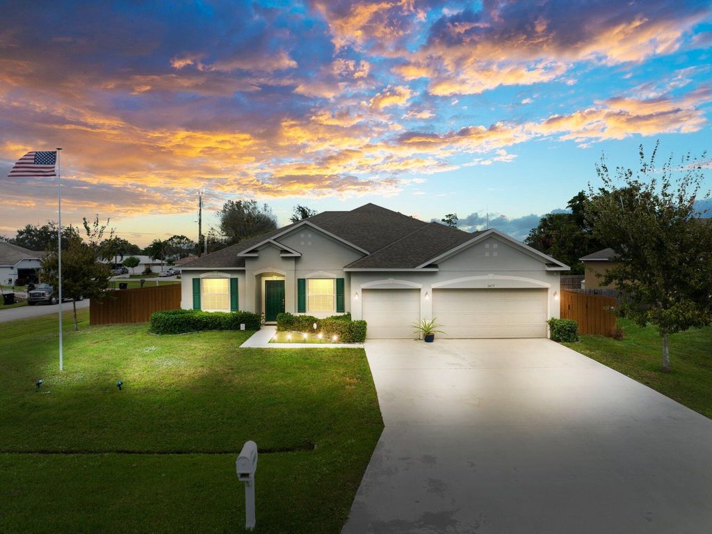 Photo of 1477 SW Goodman Avenue, Port Saint Lucie, FL 34953 (MLS # R10957254)