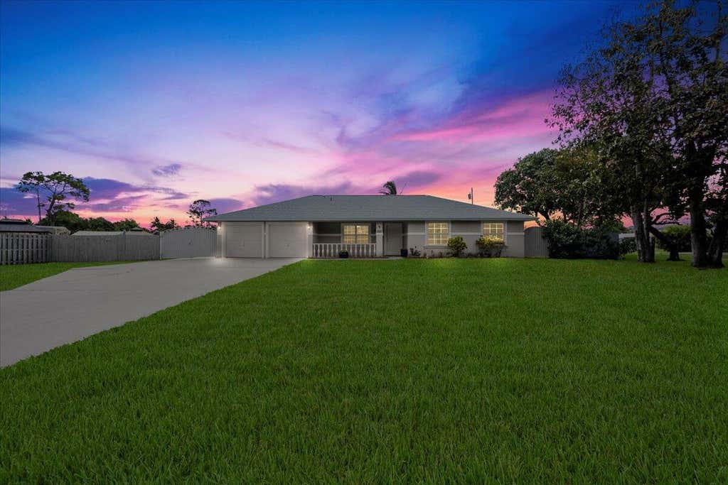 Photo of 932 Cracker Street, West Palm Beach, FL 33413 (MLS # R11079692)