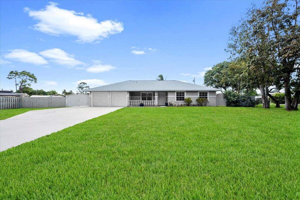 Photo of 932 Cracker Street, West Palm Beach, FL 33413 (MLS # R11079692)