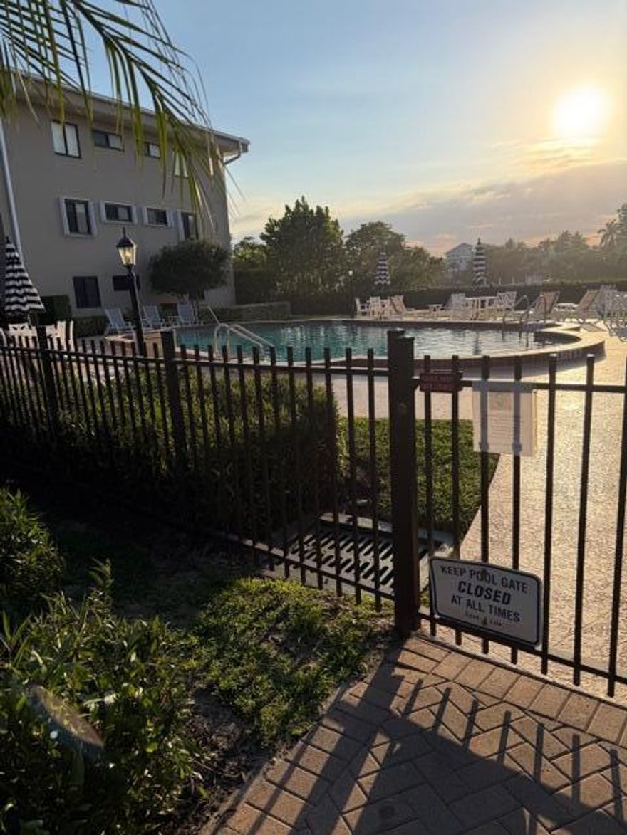 Newly painted 2 bedroom / 2 bathroom Corner end-unit with views of Southgate's infamous Lazy River, Tropical Garden and the Fountain (shaded balcony inmost popular C building). The unit comes with large 24'' tile flooring throughout, a fully screened in balcony, and a  custom screen door Impact windows and door, lots of storage space. There is a private access point to the beach (with beach equipment storage locker). The assigned parking spot is right in front the unit.  Southgate has passed the 50-yr recert., and has reserve funding is in place!