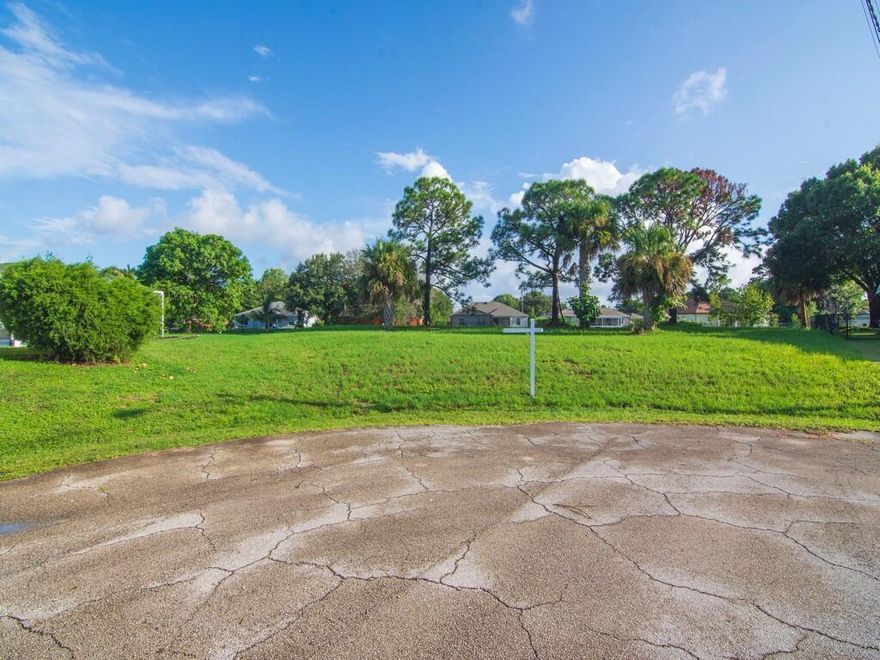 Are you searching for the perfect place to build your dream home? Look no further! We are thrilled to present to you this exceptional lot conveniently located in the heart of Port Saint Lucie. This lot offers an incredible opportunity to create your future home site. Situated in a desirable neighborhood, this generous-sized lot is surrounded by a vibrant community and boasts easy access to I-95 and the turnpike. Imagine the convenience of being just a stone's throw away from numerous shopping and dining destinations. Whether you're in the mood for a leisurely shopping spree or a delightful culinary experience, this prime location has it all. Picture yourself stepping out of your front door and being greeted by the warm Florida sun, knowing that everything you need is just minutes away.