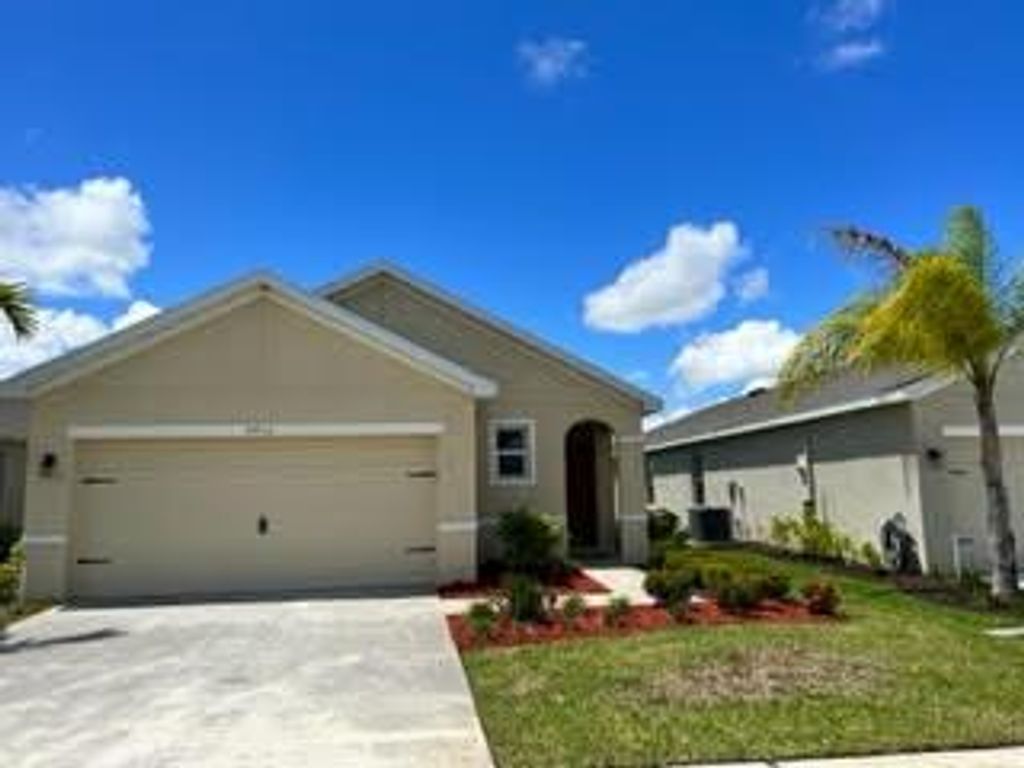 Photo of 9410 SW Ligorio Way, Port Saint Lucie, FL 34987 (MLS # R10805086)