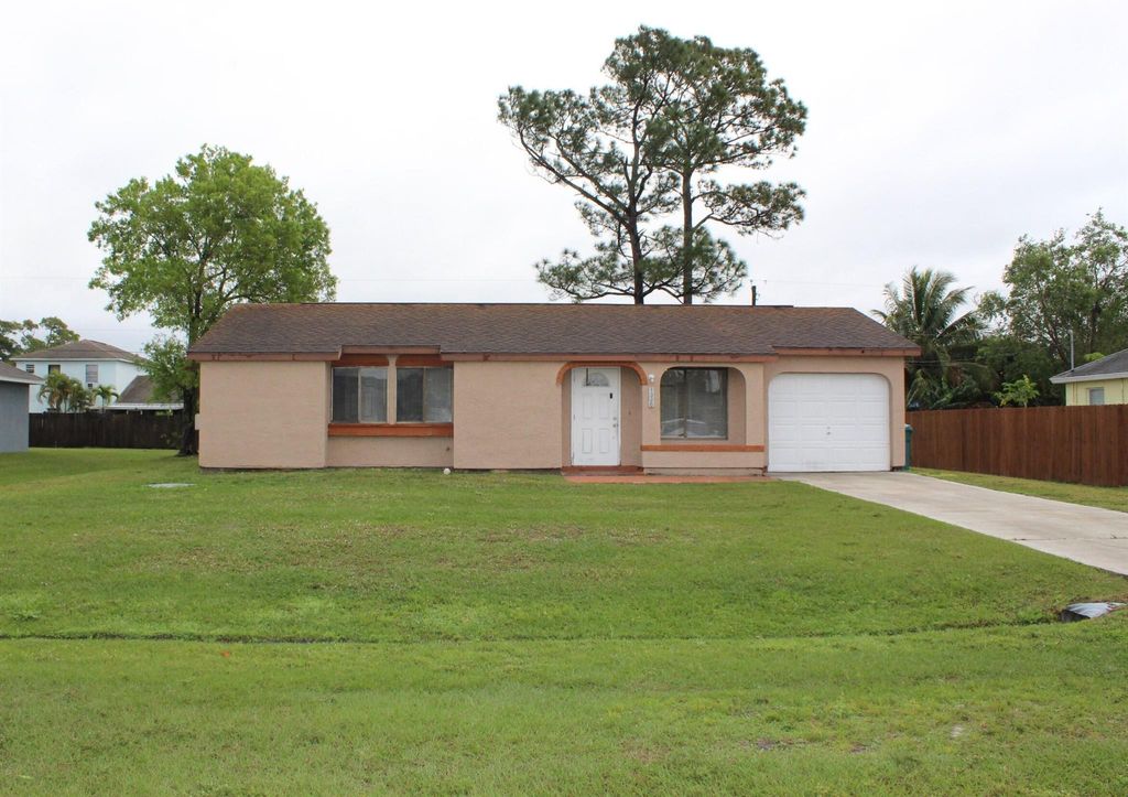 Photo of 1325 SE Sandia Drive, Port Saint Lucie, FL 34983 (MLS # R10961080)