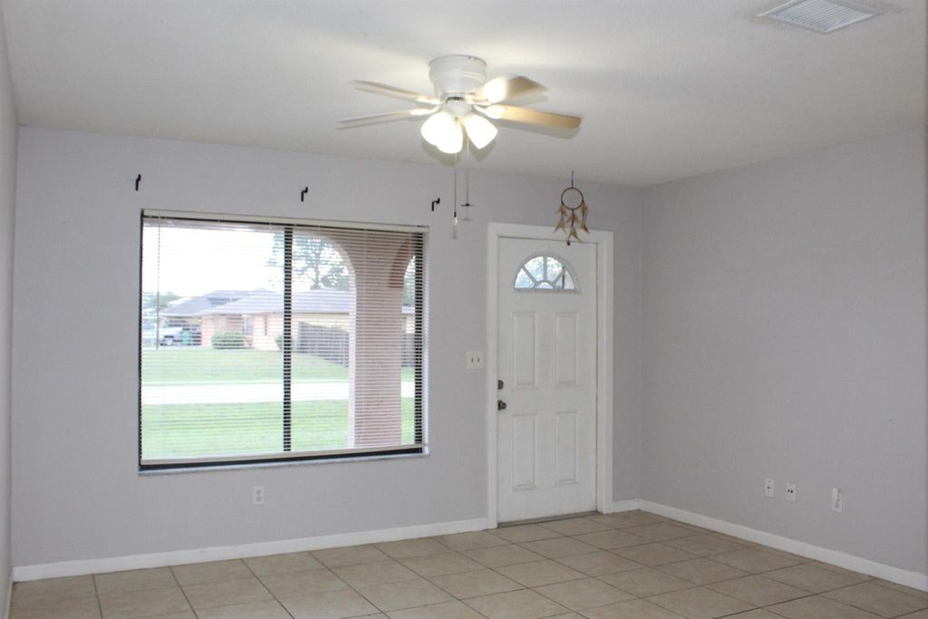 Photo of 1325 SE Sandia Drive, Port Saint Lucie, FL 34983 (MLS # R10961080)