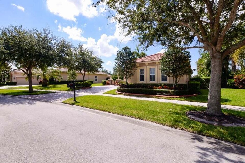 Photo of 9895 SW Nuova Way, Port Saint Lucie, FL 34986 (MLS # R10929275)