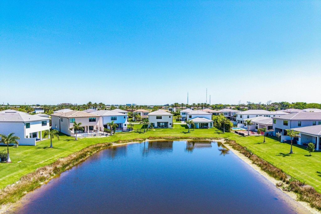 Photo of 9370 Sunflower Meadow Road, Boca Raton, FL 33434 (MLS # B26035609)