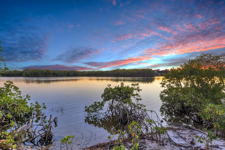 Looking to build your idyllic estate home in South Florida?  Welcome to 19000 SE Country Club Drive, a 1.88 acre property offering 128' of water frontage on the state designated wild and scenic, Loxahatchee River.  Enjoy privacy and stunning sunset views over the river and preserve island in the distance. The over 800' deep lot allows for a grand entrance and endless landscape opportunities as well as multiple garages and outdoor living spaces.
The owner will include their full set of building plans with sale, or design your own.
Photos are renderings of the owner's existing plans.
