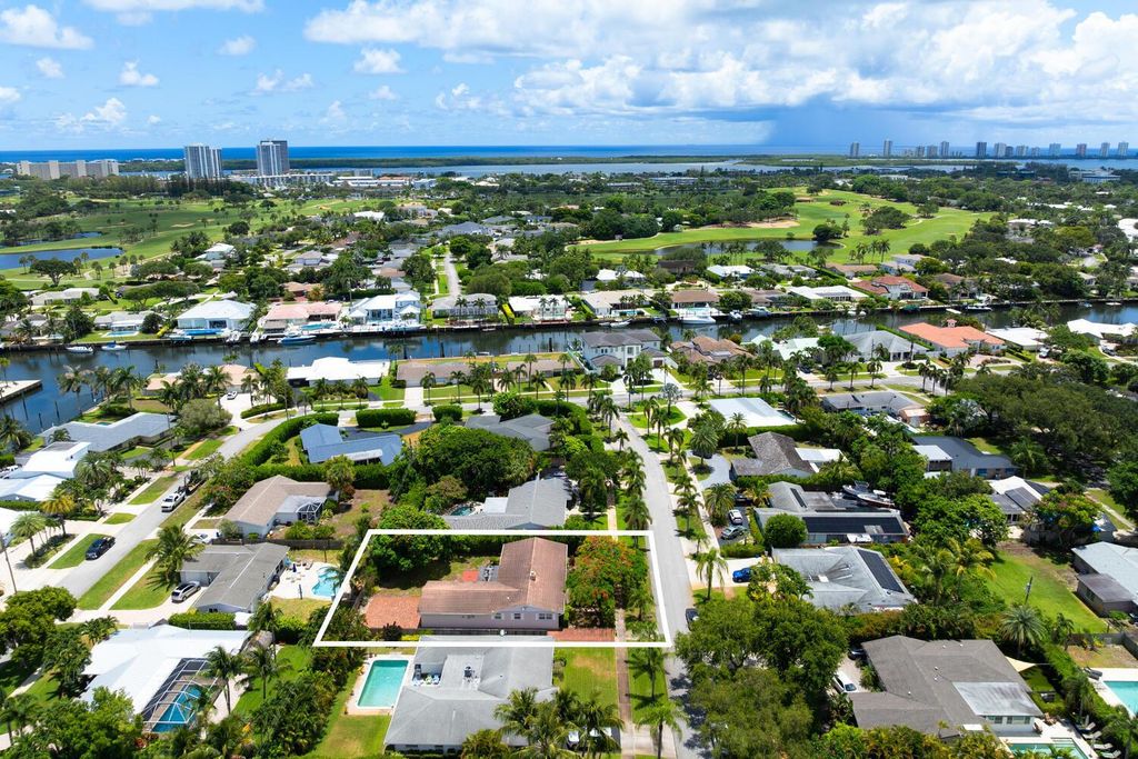 Photo of 709 Pelican Way, North Palm Beach, FL 33408 (MLS # R11103134)