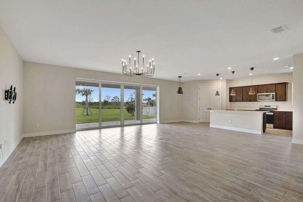 Photo of 12249 SW Sand Dollar Way, Port Saint Lucie, FL 34987 (MLS # B26009641)