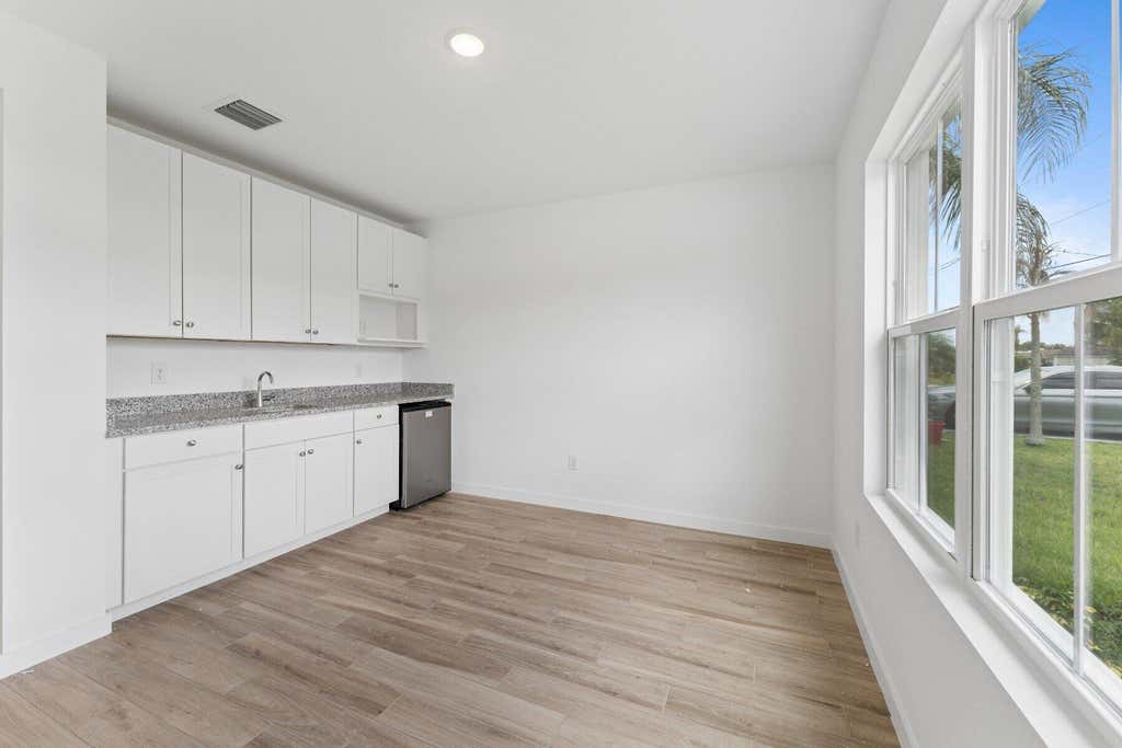 Photo of 2474 SW MERCER Street, Port Saint Lucie, FL 34984 (MLS # B26059713)