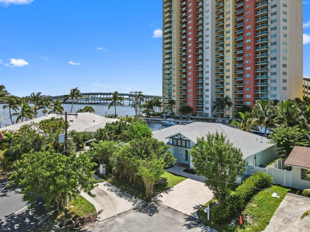 Photo of 340 Wilma Circle, Riviera Beach, FL 33404 (MLS # R10923096)