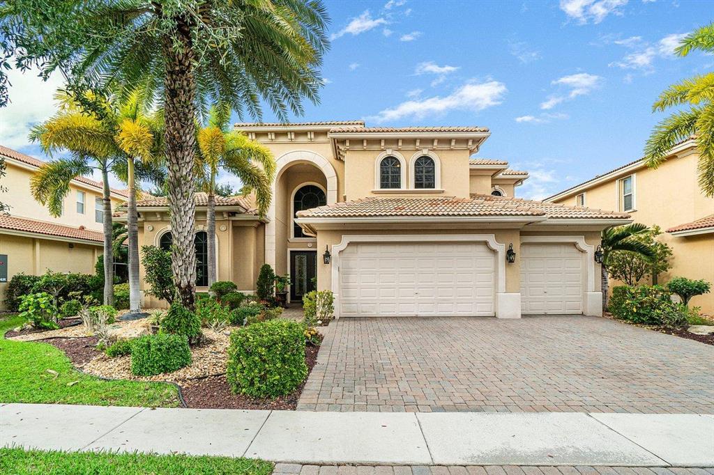 REDESIGNED KITCHEN, MARBLE FLOORS, MARBLE BATHS,CUSTOM OFFICE, ACCORDION SHUTTERS, WINDOW TREATMENTS, TANKLESS WATER HEATER, AND SO MUCH MORE. A MUST SEE.