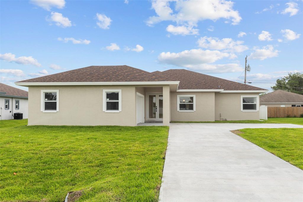 Photo of 4049 SW Port St Lucie Boulevard, Port Saint Lucie, FL 34953 (MLS # F10507686)