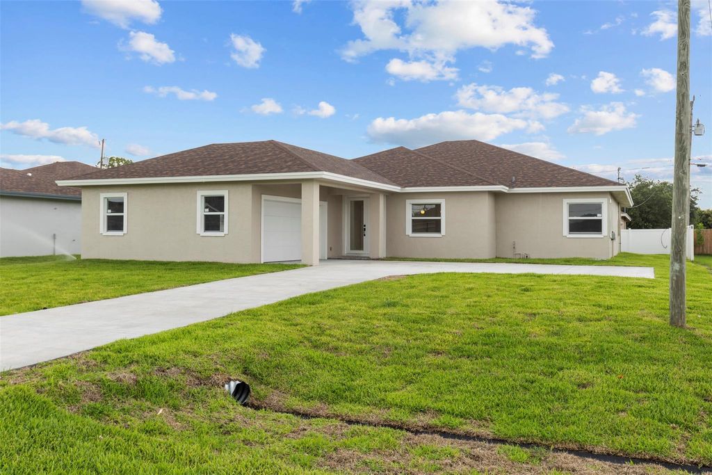 Photo of 4049 SW Port St Lucie Boulevard, Port Saint Lucie, FL 34953 (MLS # F10507686)
