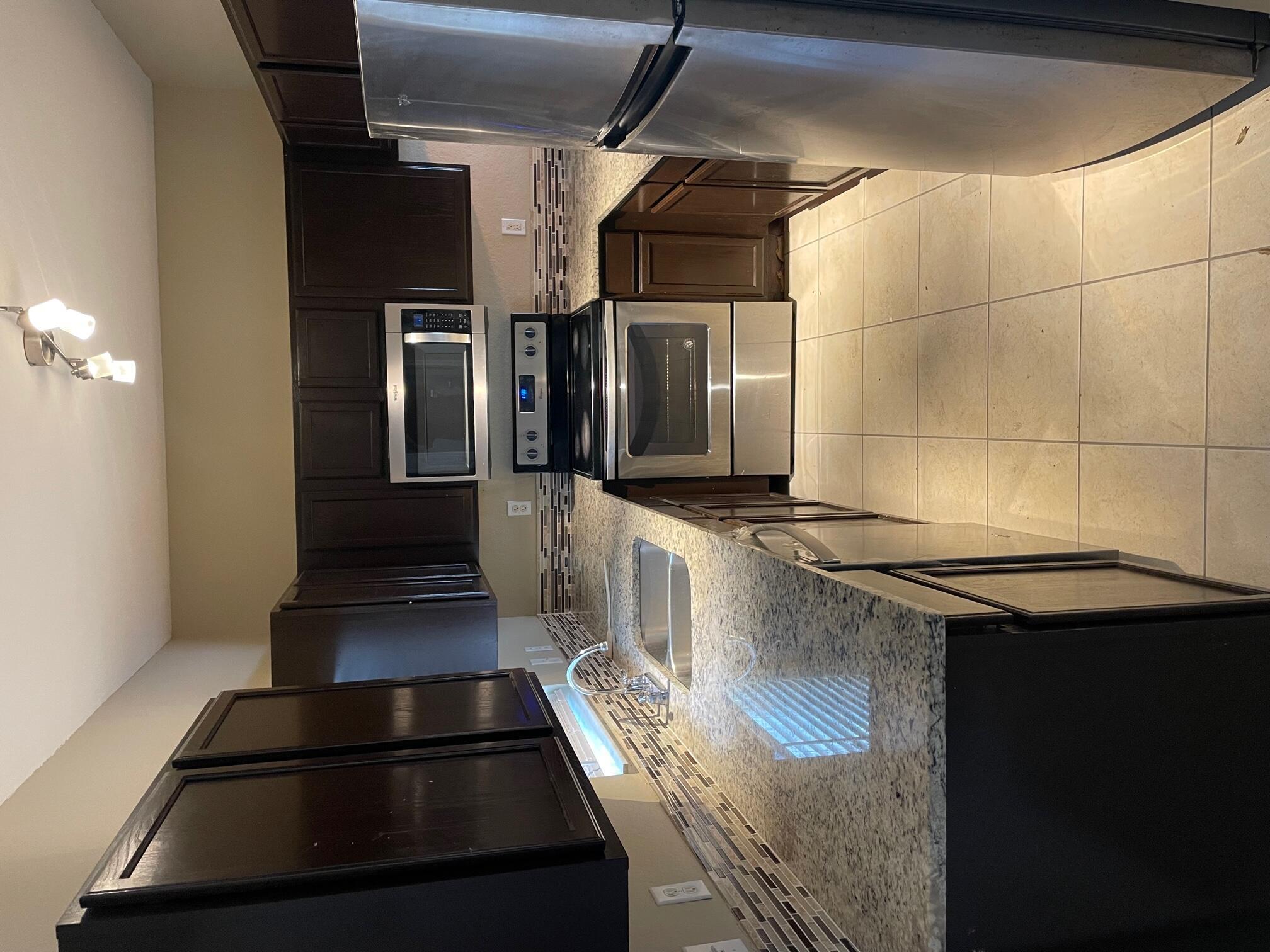 Beautiful Townhome renovated kitchen , stainless steel appliances, granite countertop, updated home.