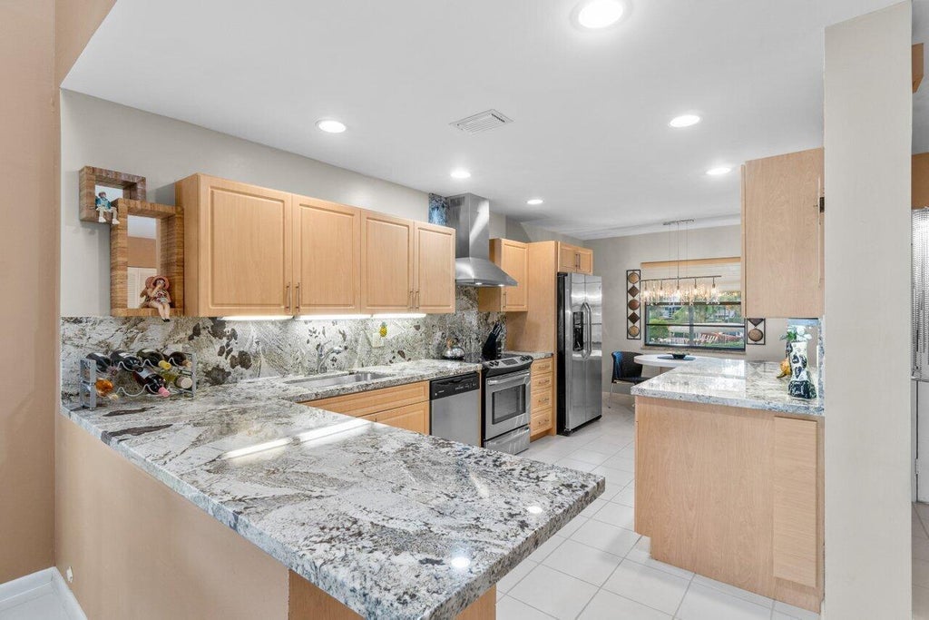 Photo of 68 EASTGATE Drive #D, Boynton Beach, FL 33436 (MLS # B26074117)
