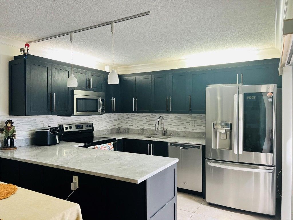 Photo of 2852 Waterford Drive #2852, Deerfield Beach, FL 33442 (MLS # F10536450)