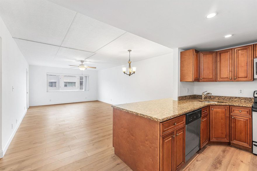 This move in ready, with updated kitchen condo on the Intracoastal is ready for it's next tenant. Just 3 miles from Clematis, this top-floor 2-bed, 1.5-bath condo offers coastal living at its finest! Enjoy a screened balcony with Intracoastal views in a gated community featuring a waterfront pool, clubhouse, 2 BBQ areas, and laundry facilities. No upstairs neighbors in this elevator building! Assigned parking + ample guest spots. Minutes to Downtown WPB, City Place, Northwood, the beach, airport, and cruise port--everything you need is close by. Boats, breezes, and beautiful views await!