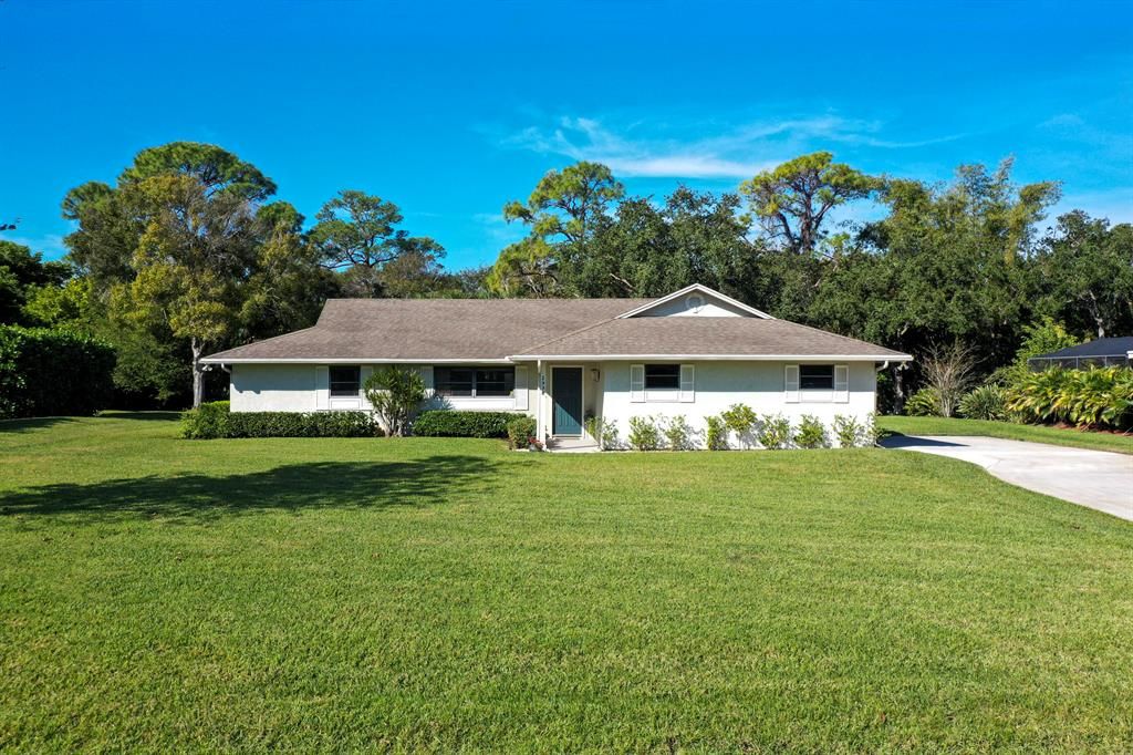 Photo of 2938 SE Farley Road, Port Saint Lucie, FL 34952 (MLS # R10688311)