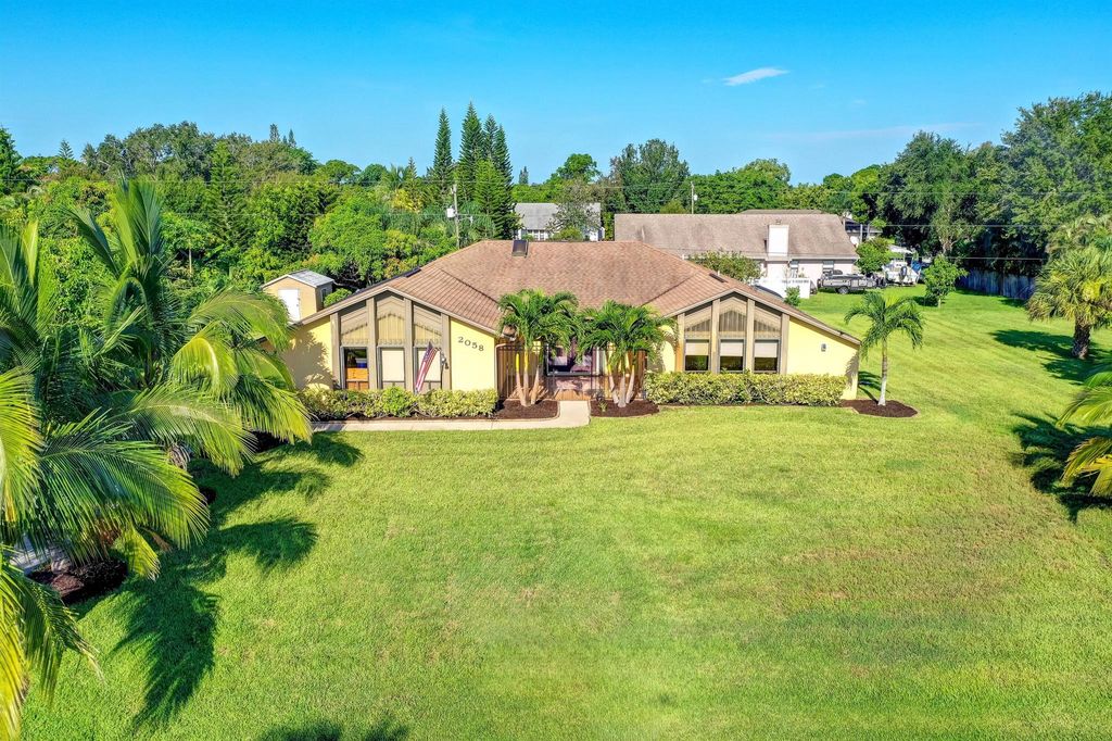 Photo of 2058 SE Morningside Boulevard, Port St Lucie, FL 34952 (MLS # R10908587)