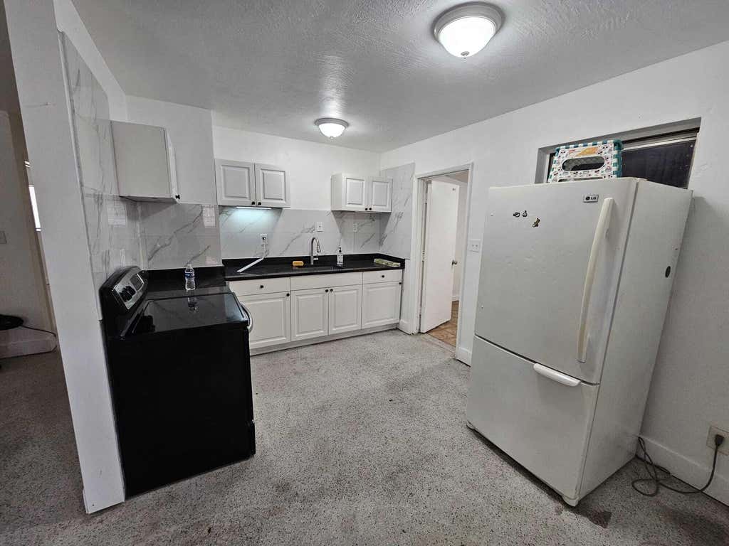 Photo of 2740 NW 2ND Street, Pompano Beach, FL 33069 (MLS # B26068057)
