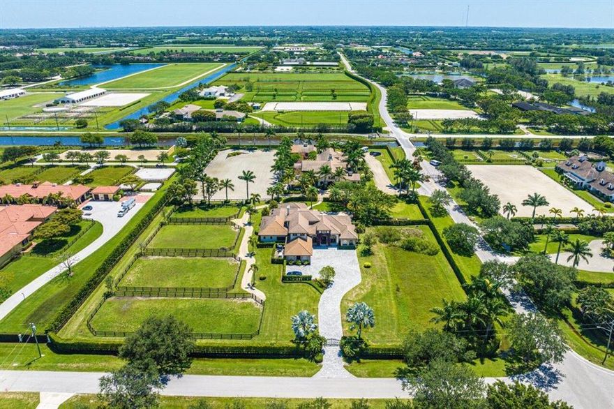 Exclusive, Idyllic and extremely private resort-like setting will capture your heart from the moment you step onto this exquisite Equestrian property! Ideally located in the enclave of Palm Beach Point and surrounded by the newest, most high-end farms, this property is destined for a discriminating professional Trainer/Rider or a fully immersed Equestrian Family whose dedication to their sport is rewarded by a luxurious, amenity-filled home that provides  ''Zen-like'' serenity for one's complete comfort.  This private oasis offers respite from the everyday stressors of showing and working horses ~ Just because your workday is hard, doesn't mean your home life needs to be too!!  So many details to share in this limited space, so please review the ''More'' Tab & the attached Documents.