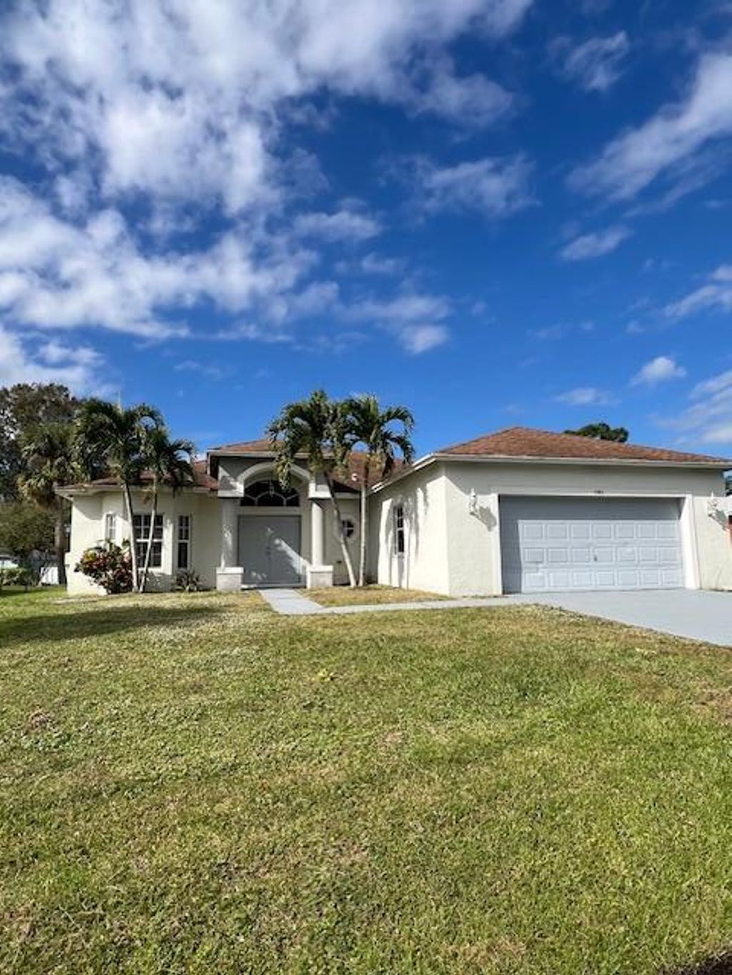 Photo of 1962 SW Erie Street, Port Saint Lucie, FL 34953 (MLS # R11044027)
