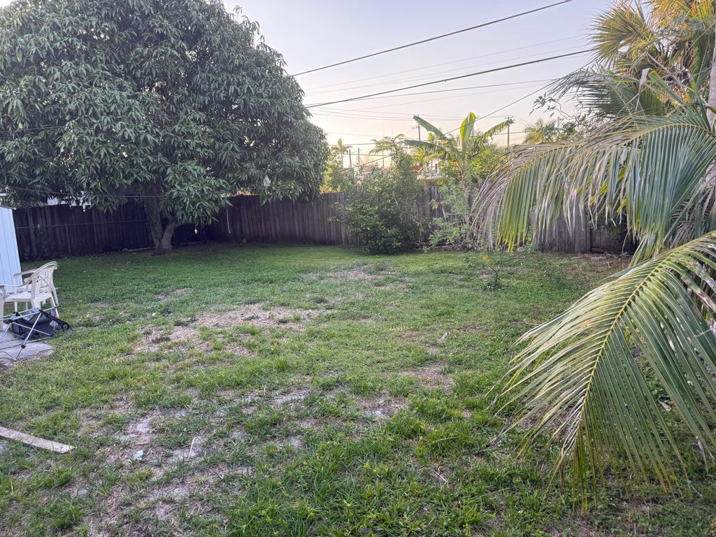 Photo of 4973 Pineaire Lane, West Palm Beach, FL 33417 (MLS # B26023384)