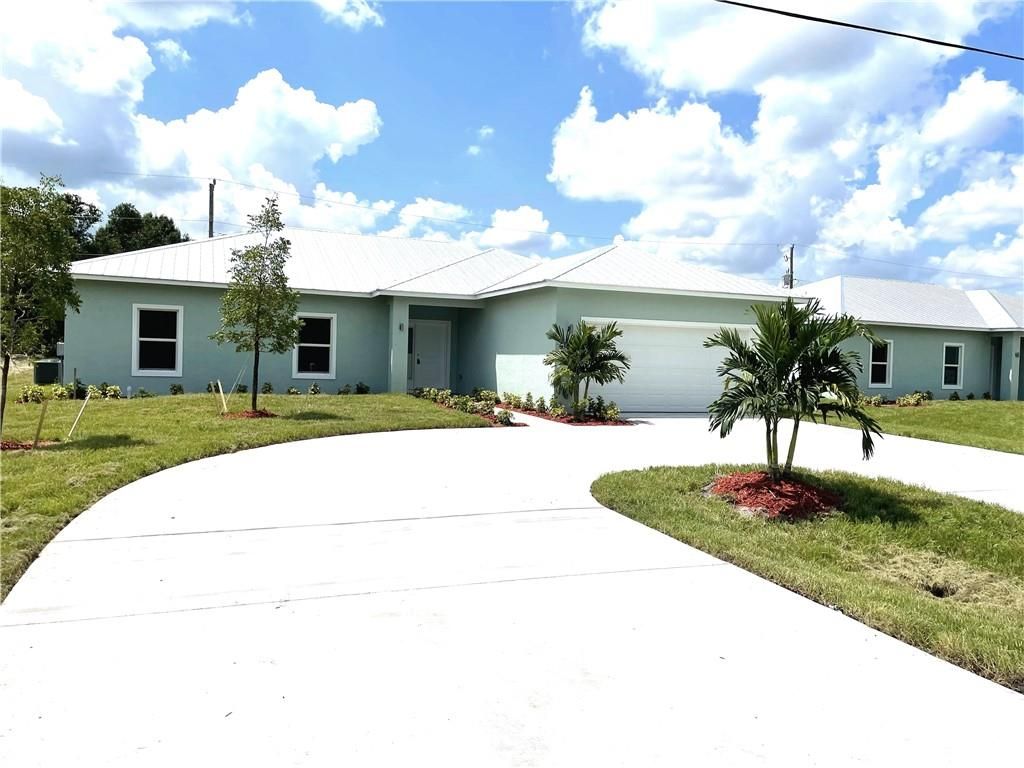 Photo of 4074 SW Port St Lucie Blvd, Port Saint Lucie, FL 34953 (MLS # F10300258)