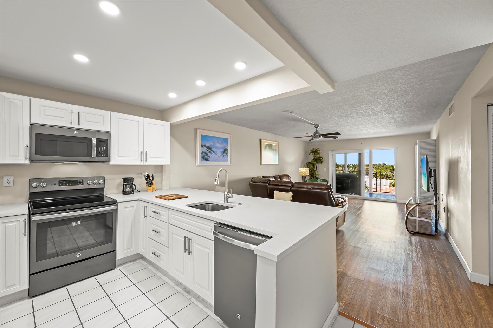 POINCIANA BY THE SEA COND - Residential