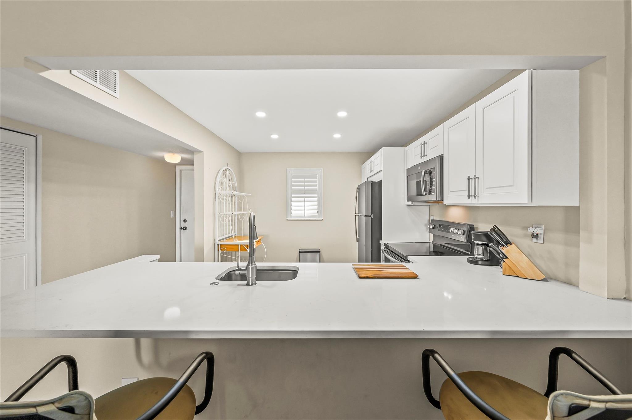 POINCIANA BY THE SEA COND - Residential