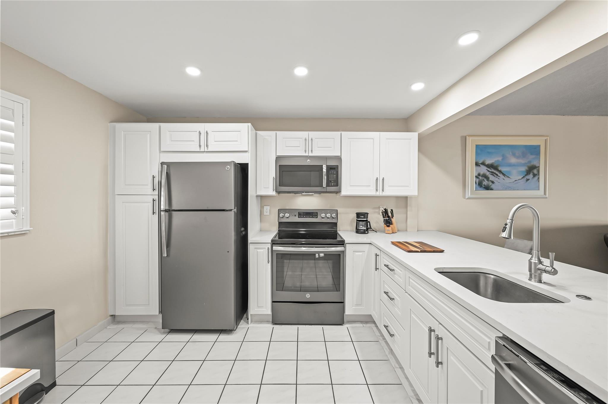 POINCIANA BY THE SEA COND - Residential